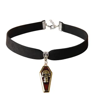 Black velvet choker necklace with skull coffin pendant, gothic jewelry accessory for women.