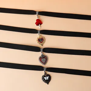 Gothic black velvet choker necklace set with dark heart alloy pendants for women and party.