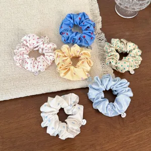 Korean sweet pleated hair scrunchies with cute heart and polka dot patterns, soft fabric.