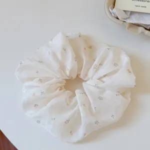 Chic floral print hair scrunchie detail, soft fabric cute hair tie for women and girls daily.