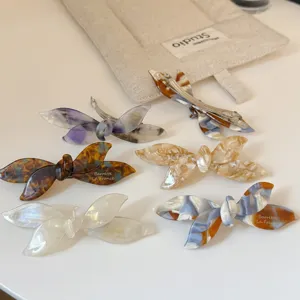 Elegante juego de pinzas de pelo con lazo de acetato, pinzas de resorte exquisitas para peinados diarios.