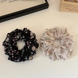 Floral organza hair scrunchie detail view, elegant hair tie for women and girls