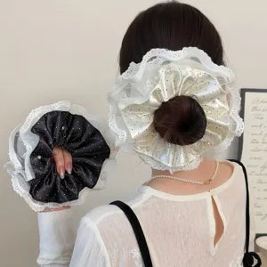 Elegant satin polka dot lace hair scrunchie for women, chic vintage bun hair accessory.