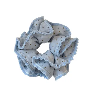 Sweet blue polka dot hair scrunchie, double layer ruffled elastic hair band for daily styling.