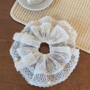 White lace pearl hair scrunchie French sweet elegant hair tie detail close up view