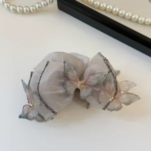 Equisite Organza Haarklammer mit 3D Schmetterlingen und funkelnden Strasssteinen.
