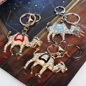 Creative rhinestone camel keychain, cute double-humped animal bag pendant, sparkling metal charm gift.