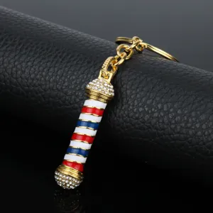 Barbiere salone palo rotante metallo strass portachiavi accessorio moda regalo