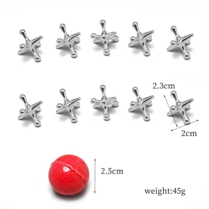 Classic metal jacks game set with red rubber ball, retro tabletop puzzle toys for kids and adults.