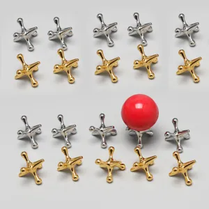 Metal jacks game set with red ball, classic desktop puzzle toy for kids and stress relief.