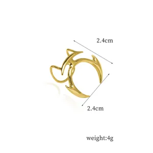 Detailed view of the punk style gold lip cuff, showcasing its unique non-pierced design and finish.
