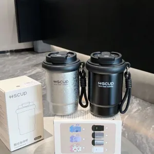 Portable stainless steel coffee cup detail view, double-drink lid with strap, 420ml capacity.