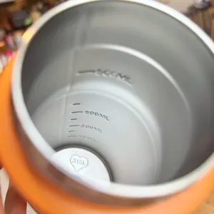 Stainless steel thermos cup inner detail showing 316L material and clear capacity scale.