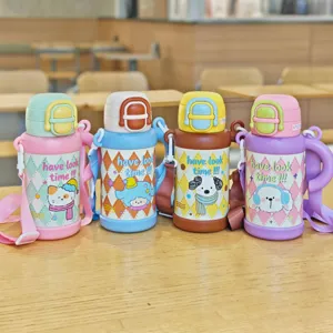 Detailed view of cute cartoon cat and dog stainless steel children thermos water bottles.
