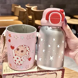 Kids stainless steel vacuum insulated water bottle with cute star pattern and strap.