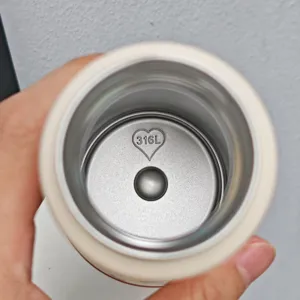 Detailed close-up view showing the premium 316L inner liner of the vacuum insulated cup.