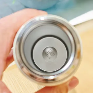 Stainless steel vacuum insulated water bottle interior detail showing SUS 316 material stamp.