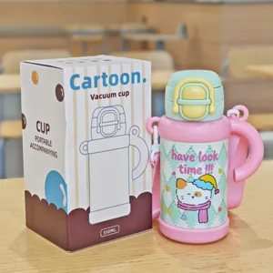 Detail view of kids vacuum cup with cute cat cartoon and pastel pink strap, 550ml capacity.