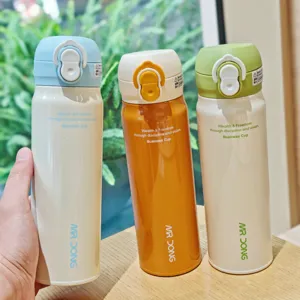 Stainless steel vacuum insulated water bottle with dual drink pop-up lid portable design.