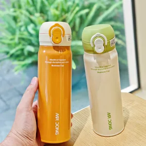 Stainless steel vacuum insulated water bottle with dual drink lid, stylish portable tumbler.