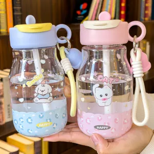 Detailed view of cute portable student straw water bottles with strap, dual pastel colors design.
