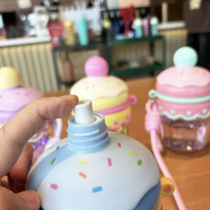 Cute cake shape water bottle kids portable straw cup cute design portable drinking cup with strap