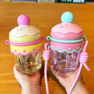 Detail view of cute cupcake shaped water bottles with straps, featuring lovely lids and cups.