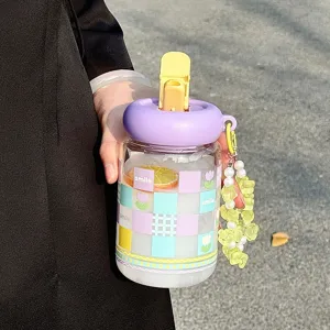 Cute glass water bottle with straw, pastel plaid pattern and aesthetic beaded charm.