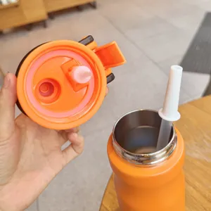 Stainless steel spray water bottle detail showing inner straw lid structure portable