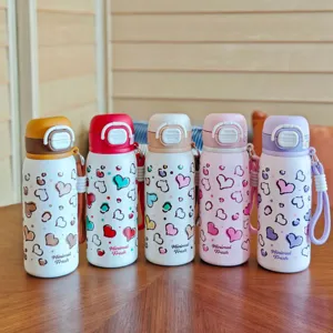 Stainless steel thermal water bottle with cute heart pattern and handle for students daily use.