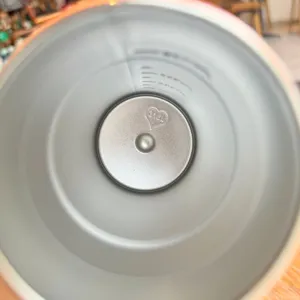 Stainless steel thermos cup interior detail view, showing 316L material and capacity scale marks clearly.