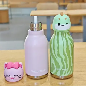Cute cartoon animal head stainless steel vacuum insulated water bottle with straw and lid.