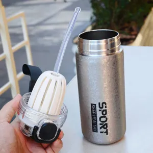 Stainless steel vacuum insulated water bottle with straw, detail view of the lid and inner structure.