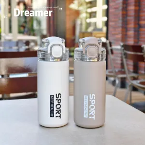Stainless steel vacuum insulated water bottle detail view, durable sports cup with straw design.
