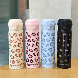 Stainless steel vacuum insulated water bottle with stylish leopard print, portable flask for daily use.