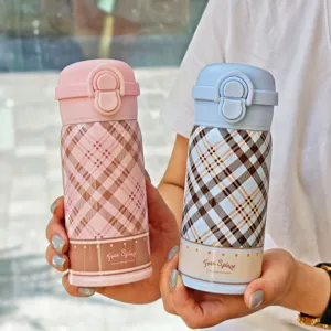 Stainless steel vacuum insulated water bottle with cute plaid pattern, portable design.