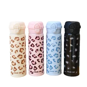 Stainless steel vacuum insulated water bottle with stylish leopard print and flip lid.