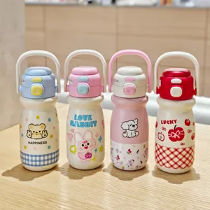 Cute stainless steel children's vacuum insulated water bottle with dual-drink straw design.