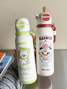 Cute cartoon stainless steel thermal water bottle with straw and strap, portable design.