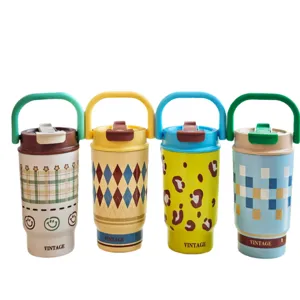 Portable stainless steel coffee tumbler with handle, stylish pattern insulated travel mug.
