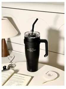 Large capacity stainless steel insulated tumbler with handle and straw for daily use.