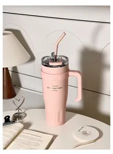 Pink insulated stainless steel tumbler with handle and straw, portable travel mug for daily use.