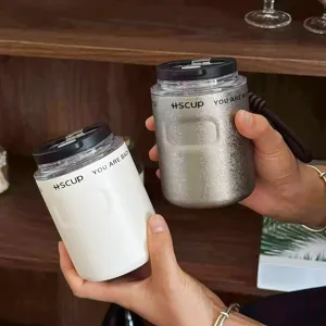 Portable minimalist stainless steel coffee cup dual drink mini vacuum mug for travel.