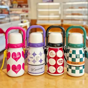 Portable insulated water bottle with handle, stylish stainless steel vacuum flask.