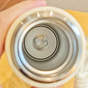 Stainless steel vacuum insulated water bottle interior detail showing 316 grade material.