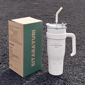 Large capacity stainless steel tumbler with handle and straw for daily use, insulated.