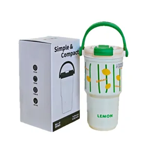 Tazza termica sottovuoto in acciaio inossidabile con manico verde portatile e motivo limone.