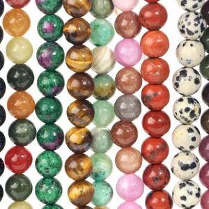 Fili di perle tonde in pietre naturali per creazione di gioielli fai da te e collane.