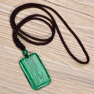 Green malachite square pendant necklace detail, vintage sweater chain jewelry showcase.