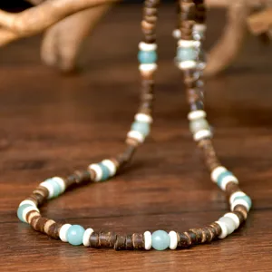 Collana di perle in guscio di cocco e turchese vintage da uomo, elegante gioiello boho chic.